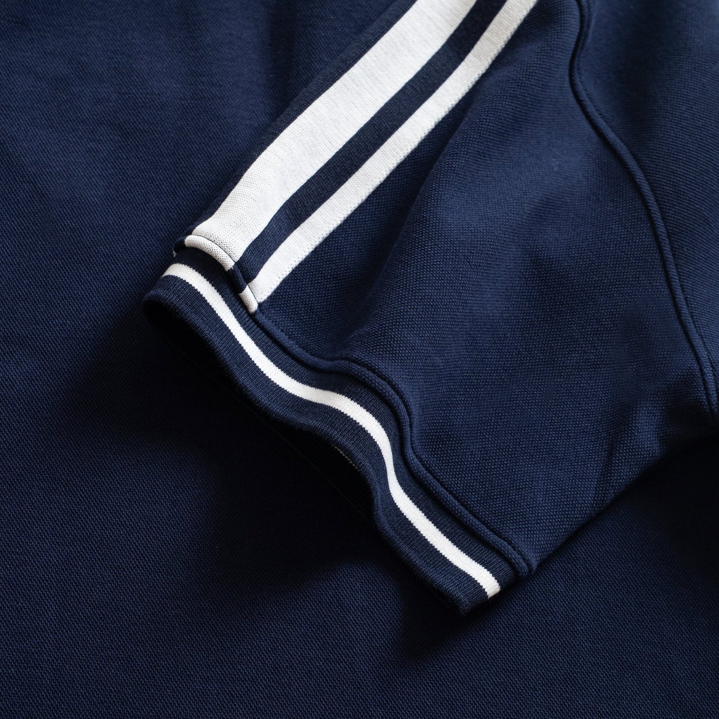 HUSTLE SHIELD POLO